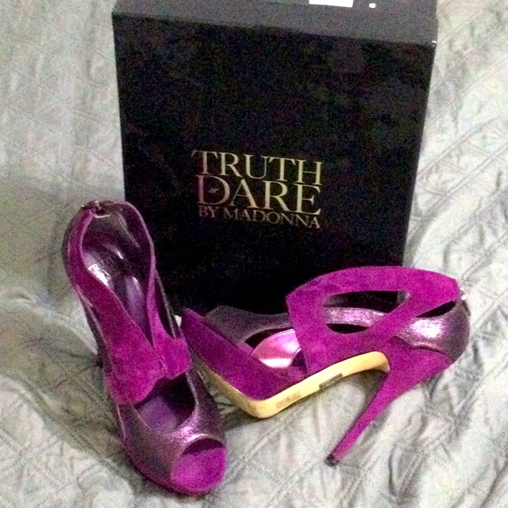 Purple shines and suede high heels.